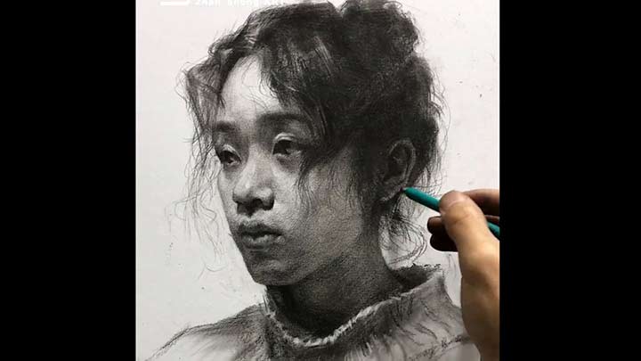 Artist with skillful charcoal drawing technique
